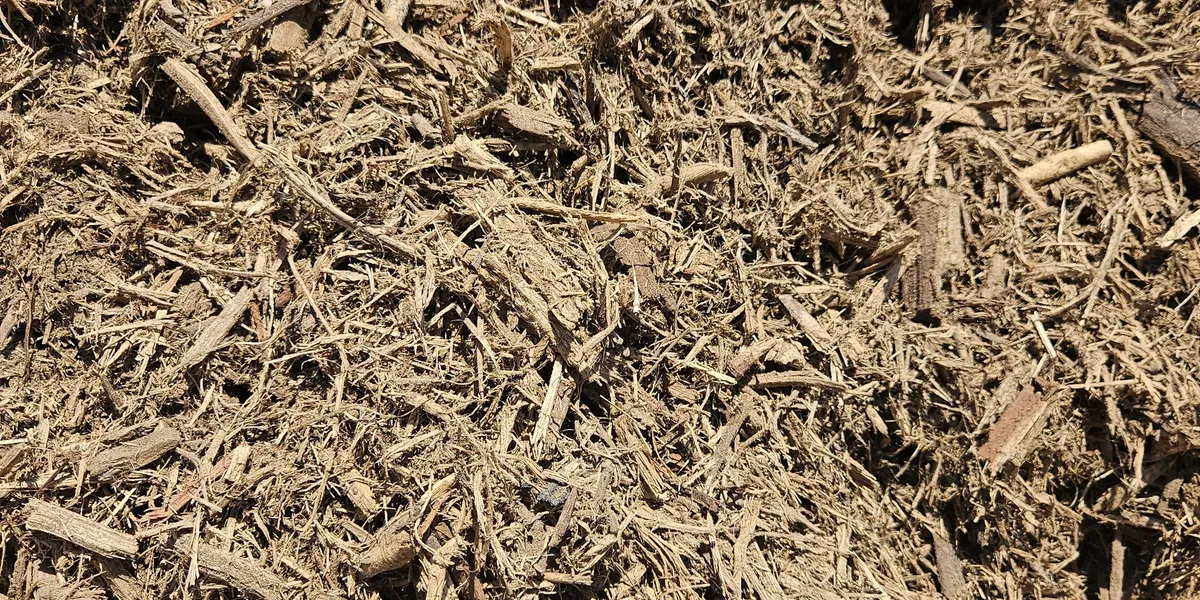 Front yard rock area to be mulched at Tamara Perry's property