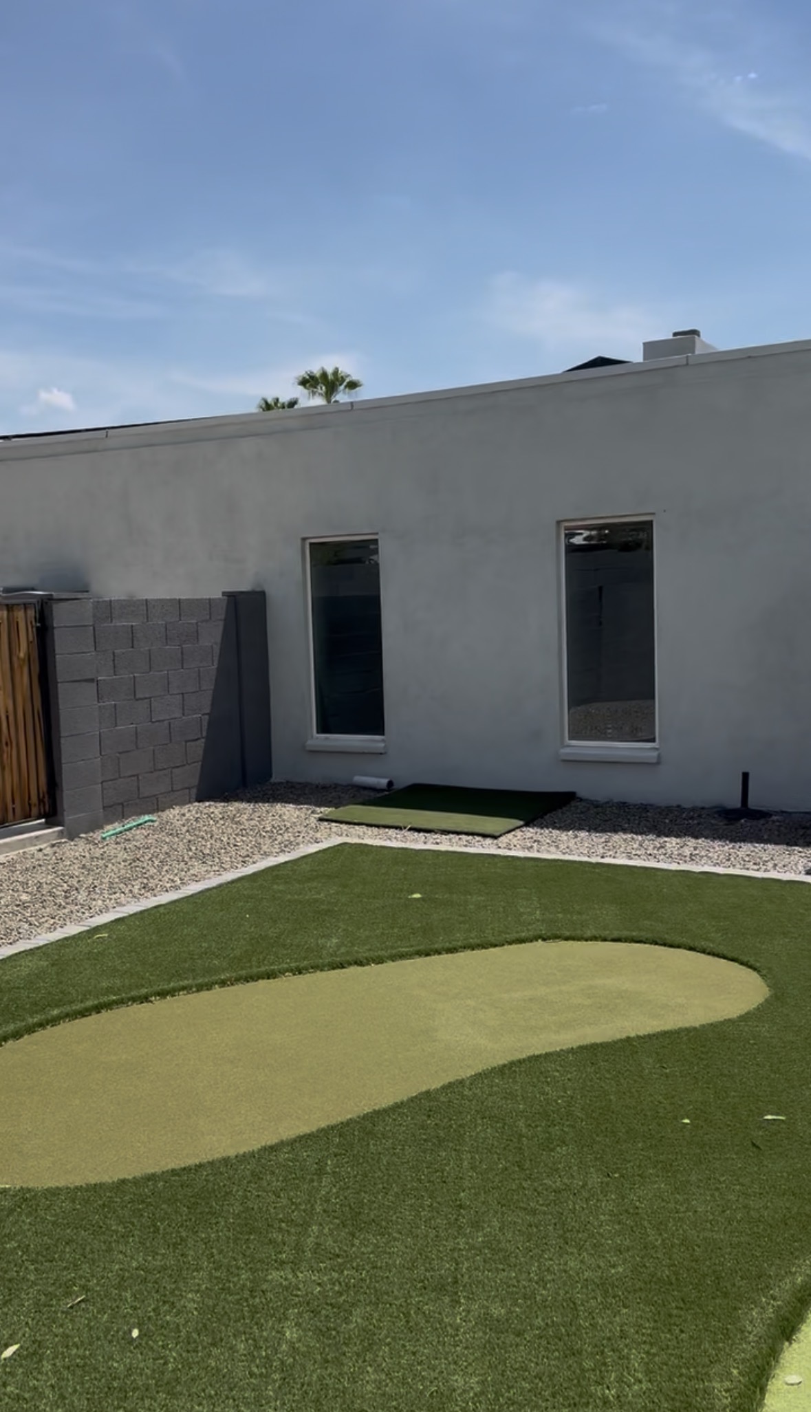 North-facing backyard wall where the twisted myrtle screen will go