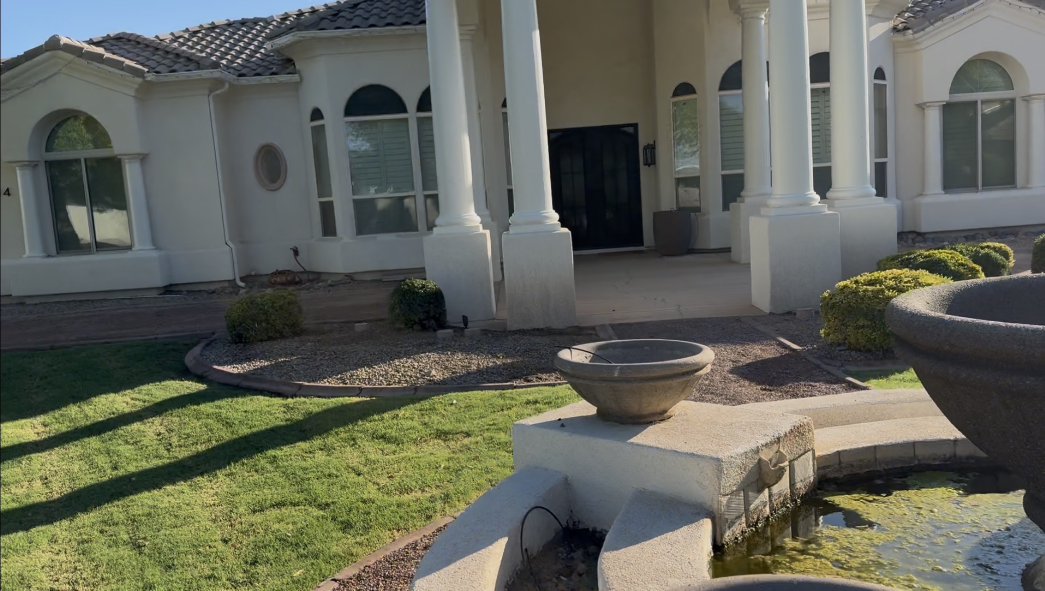 Both sides of front walkway